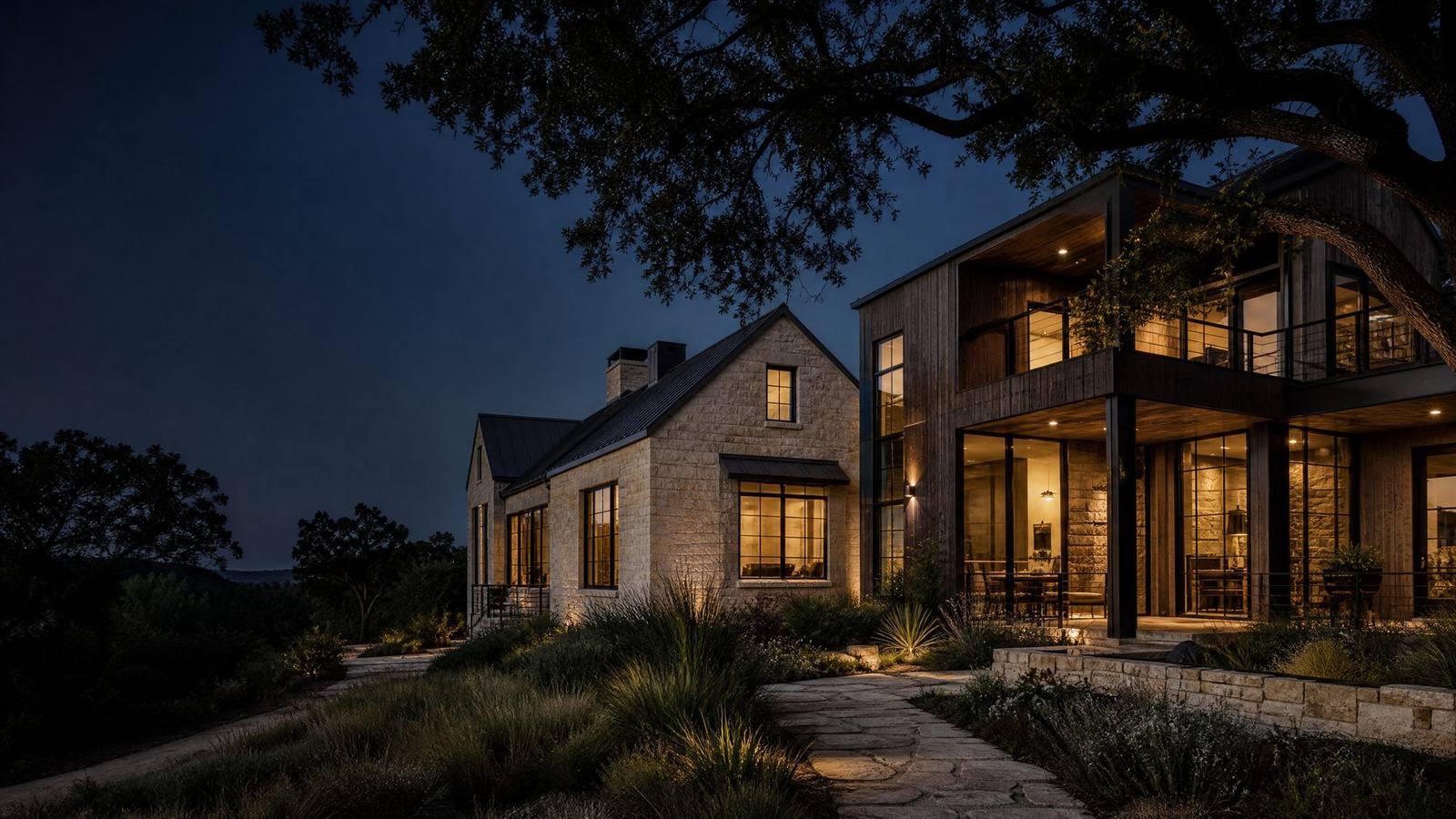Editorial view of a modern Austin home with warm interior lighting and limestone exterior